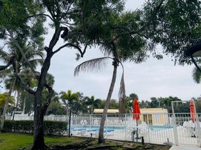 491 Racquet Club Rd 211, Weston FL 33326