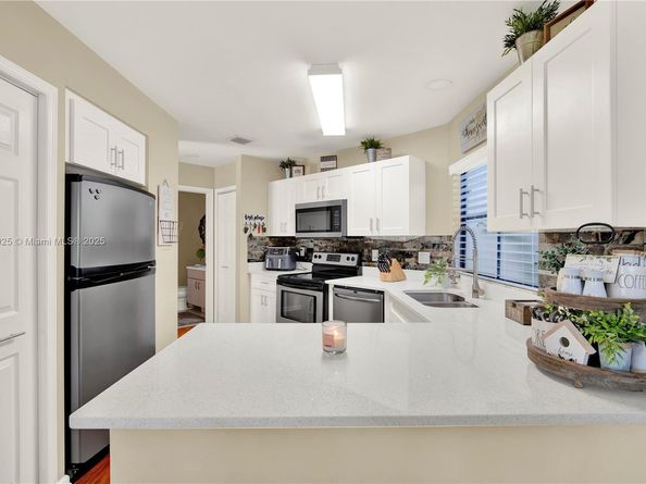 130 Weybridge Cir Unit C, Royal Palm Beach FL 33411
