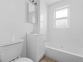 126-19 Sutter Avenue, South Ozone Park NY 11420