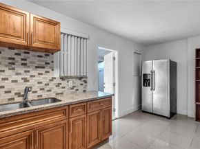 1064 NW 103rd St, Miami FL 33150