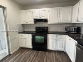 817 NE 214th Ln 4, Miami FL 33179
