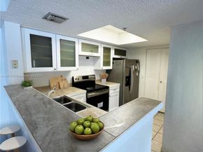 5031 Wiles Rd 202, Coconut Creek FL 33073