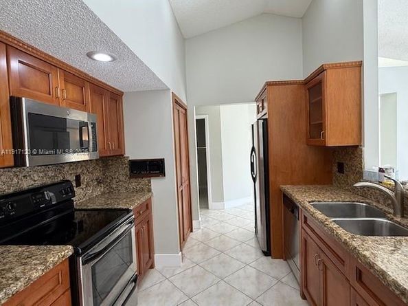 1875 NW 93rd Way, Plantation FL 33322