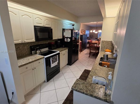 12955 SW 16th Ct 101M, Pembroke Pines FL 33027