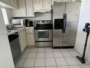 496 NW 165th St Rd D611, Miami FL 33169