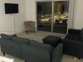 496 NW 165th St Rd D611, Miami FL 33169