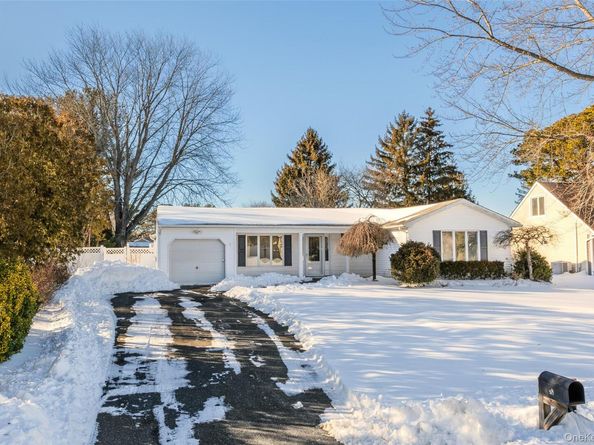 18 Woodbrook Drive, Ridge NY 11961